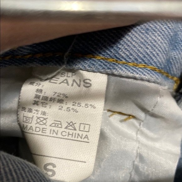 Blue Flare Jeans with Colorful Floral Accents - Picture 3 of 8